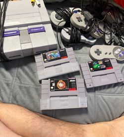 Super Nintendo with games
