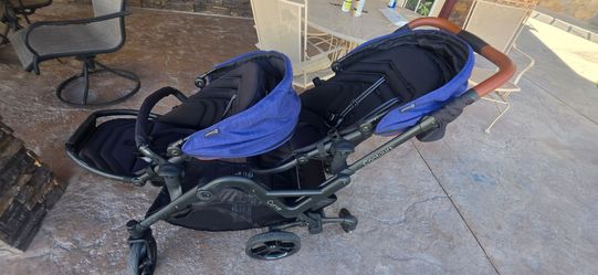 Contour curve double stroller