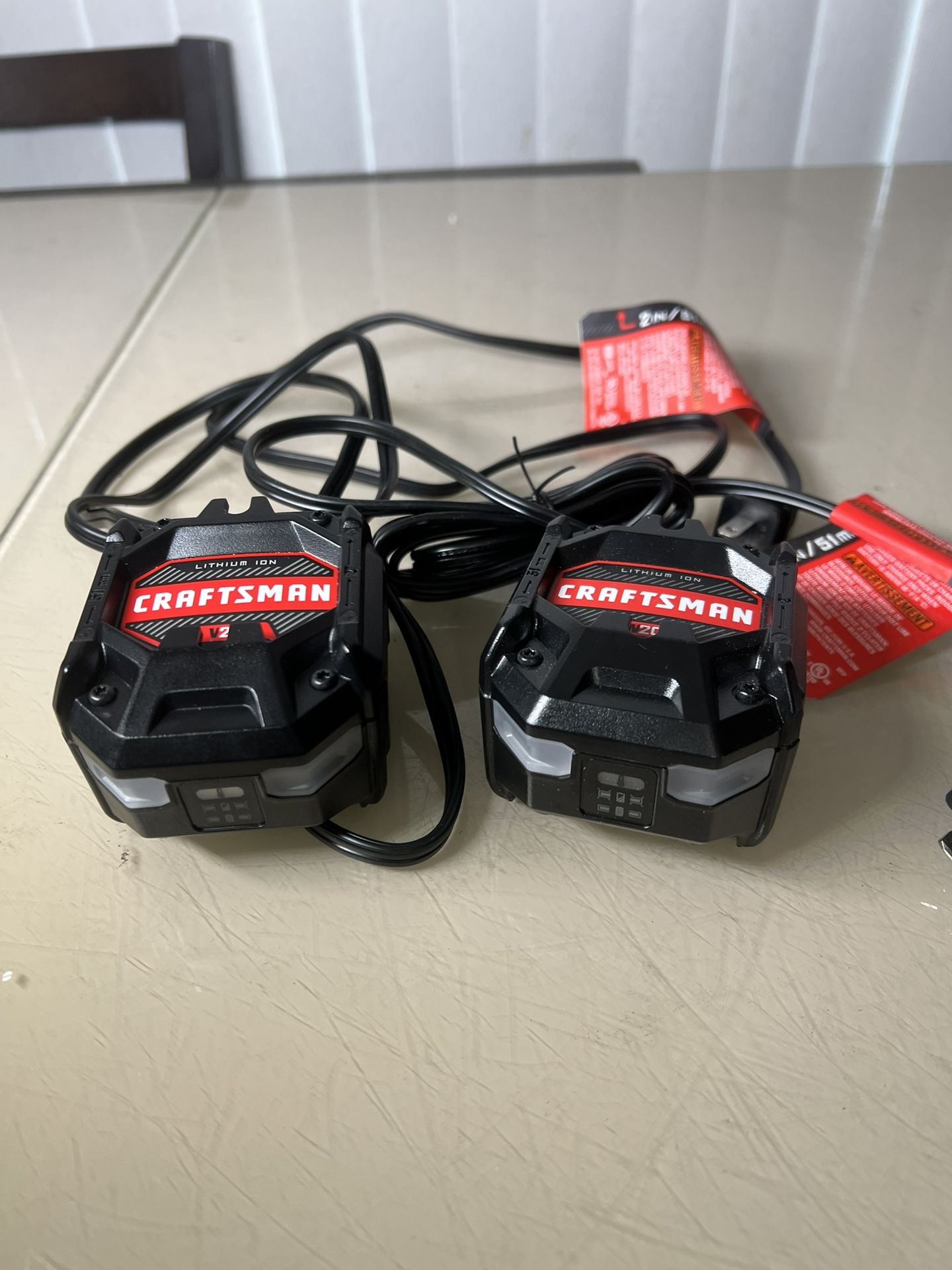 Lot Of 2 Craftsman CMCB101 20V Battery Charger Lithium Ion 20 Volt. New Open Box however there are a couple of very, very tiny scuff marks on one fron