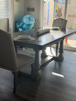 6-7 ft table heavy with one fabric head chair