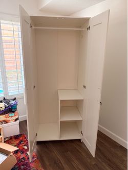 Tall White Clothes Closet