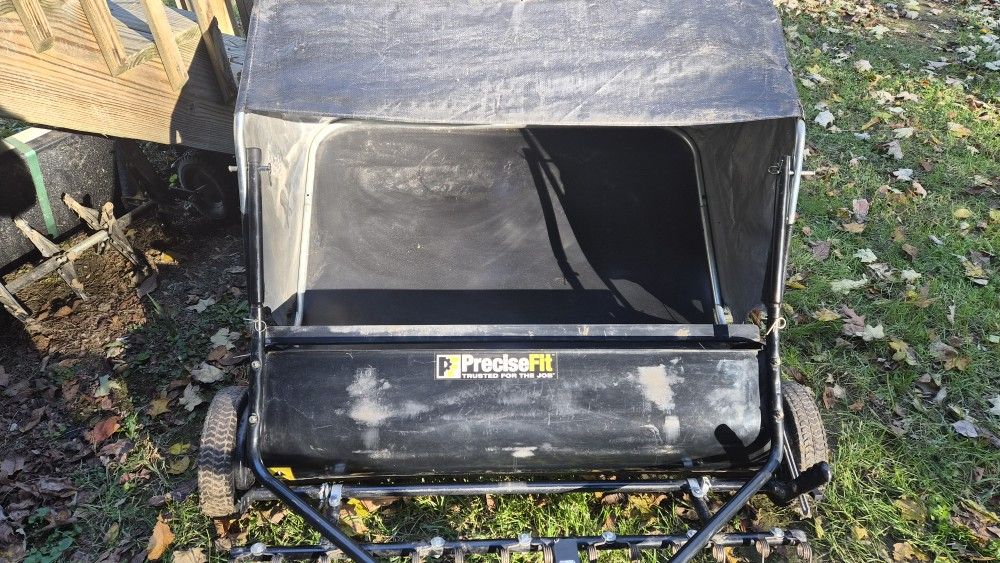 Lawn Sweeper with Raking Tines
