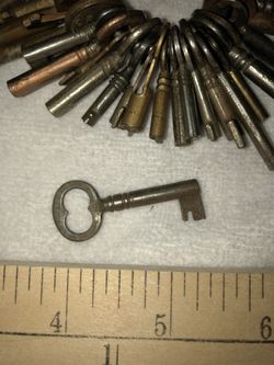 Old Cabinet Curio Desk keys $1. Each.