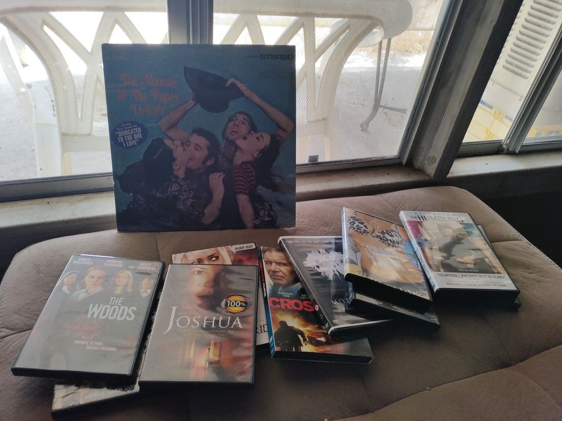 25 FREE DVD- Movies W/Purchase Of Album ( pick. Up Only
