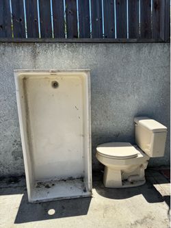 Porcelain Tub & toilet