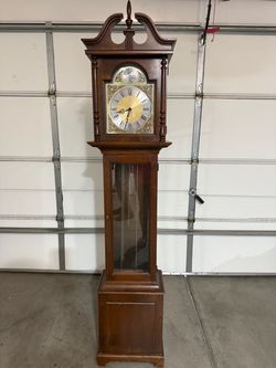 Grandfather clock  Wide: 16” inches  Deep: The 10”  High: 72”inches  In very good condition some scratches here and there