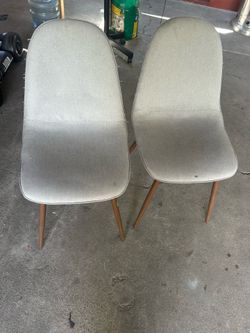 Dorel Home Brandon dining chair with grey upholstery and metal legs