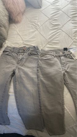 2 pairs of grey jeans size 4t new with tags never used one is from H&M and the other one from Childrens place