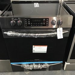 New Scratch And Dent Frigidaire Gallery 5 Burner Glass Top Black Stainless Steel Slide In Range. 1 year Warranty 