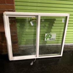 2 New Vinyl Sliding Windows – Ply Gem