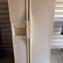 White GE Refrigerator And Freezer