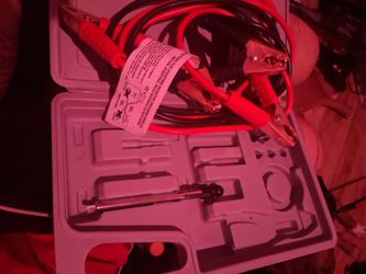 Jumper cables and tire air gauge