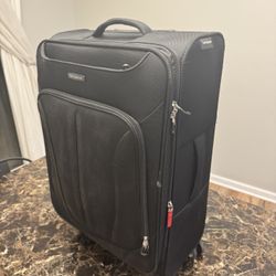 Medium Samsonite luggage 