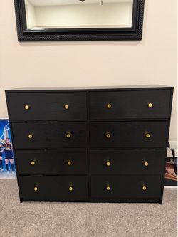 Black Dresser with gold knobs