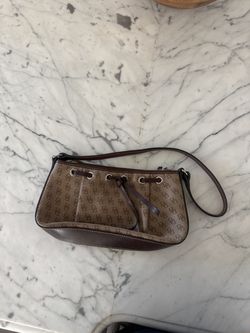 Dooney & Bourke Tassel top zip