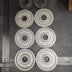 Good Condition 2.5lb And 5lb Olympic Weight Plates --