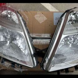 06-09 Toyota Prius Headlights faros lights luces calaveras micas