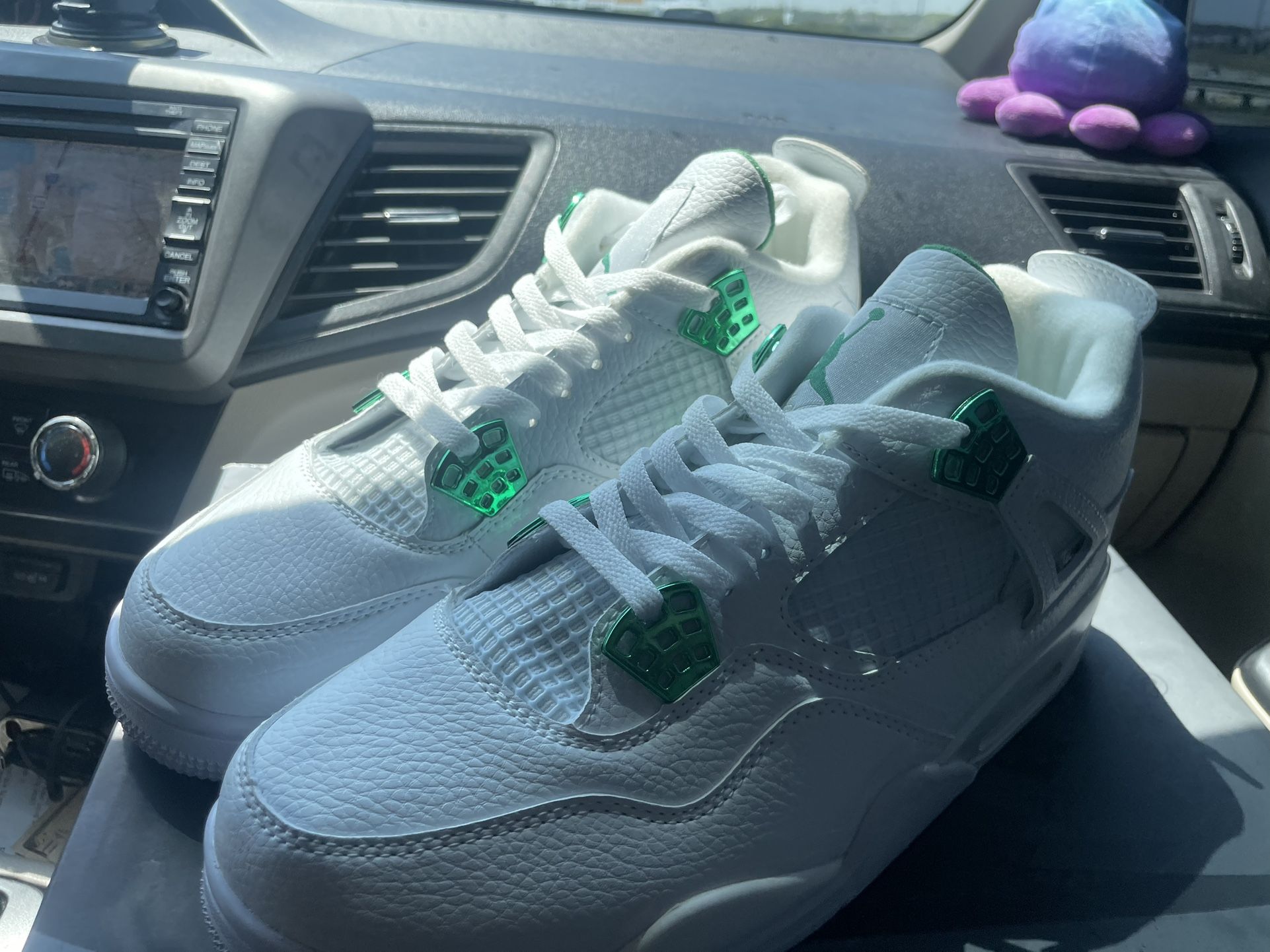 Metallic Green Jordan 4s