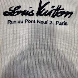 Authentic Louis Vuitton "Rue du Pont Neuf" Ribbed Knit Sweater (White)
Price: $650