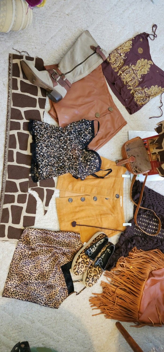 3 Camisole Tops,2 Mini Skirts ,1 Sweatervest From 70's, 1 Fringe Fau Leather Purse, 1 Real Leather Purse NO SHOES!! 8 Pieces + Fabric$70. Fo 8 Pieces