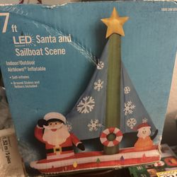 Gemmy 7 ft LED Christmas Santa and Sailboat Scene Airblown Inflatable