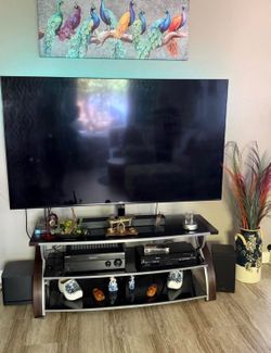 75-inch LG NanoCell 4K Smart TV (Model 75NANO90UNA) with matching entertainment center/TV stand