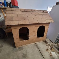 Large wooden dog house
