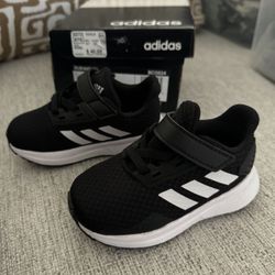 New baby size 5 Adidas shoes 