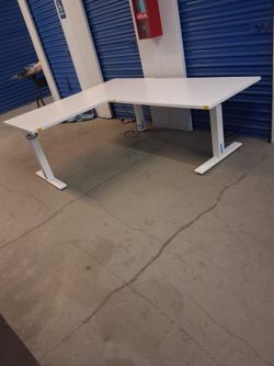 L shape Electric sit and Stand Desk disassembled for easy transport