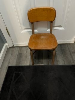 Vintage Very old Heywood Wakefield Child's Chair Solid Wood & Metal.  Size approximately 12 inches wide and 22 inches tall .  The chair has one crack 