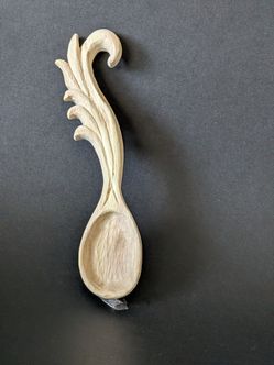 Hand carved honey with spoons