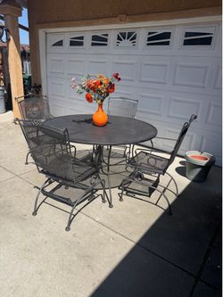 Vintage Plantation Patterns patio set with rocking chairs