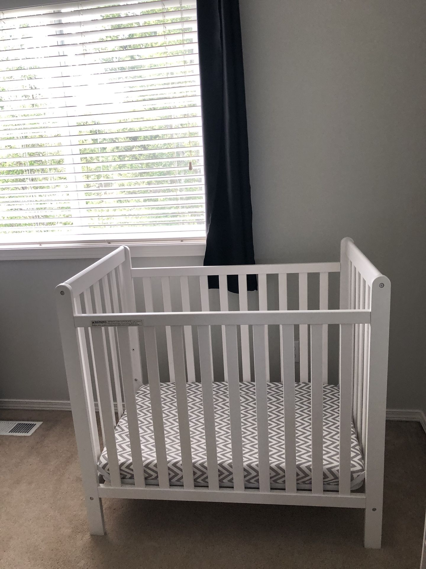 White Delta Mini Crib