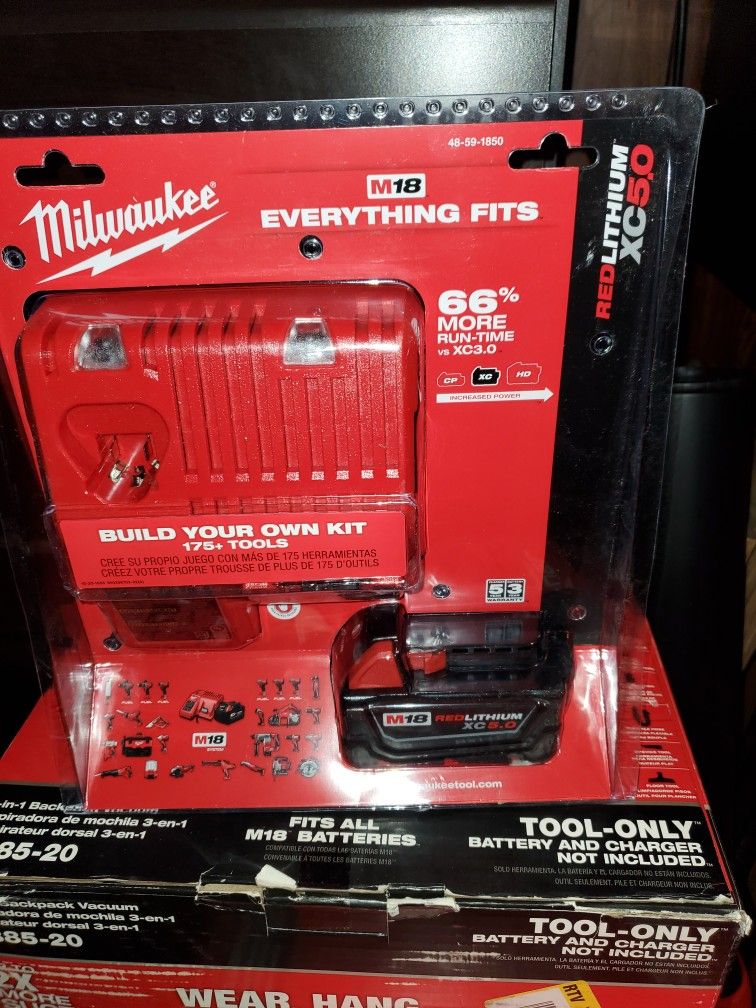 Milwaukee M18/M12 Charger And 5.0 Battery. No Offers Accepted. 80$