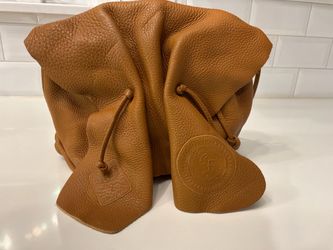 Vintage Carlos Falchi genuine pebbled leather crossbody bag in a rich camel/brown color.