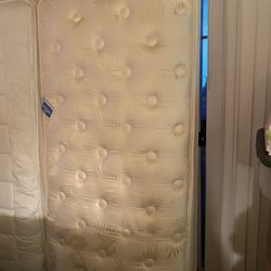 Two  Simmons Twin Beds 