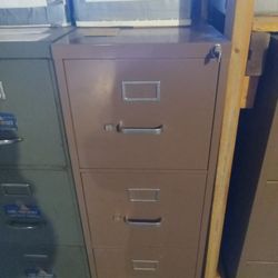 File Cabinet. Four Drawers. With Key. Good Condition