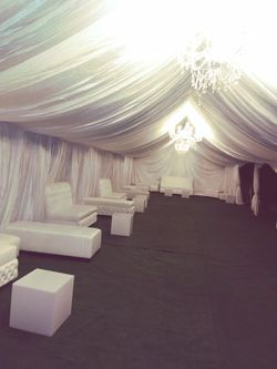 Draping and sofas. Tente rentals.portables restrooms.