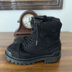 BALENCIAGA DISTRESSED COMBAT BOOTS