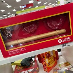Dumpling Making Kit includes rolling pin, silicone rolling mar, and 2 dumpling mold tools