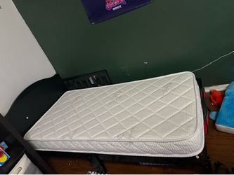 Toddler bed and mattress