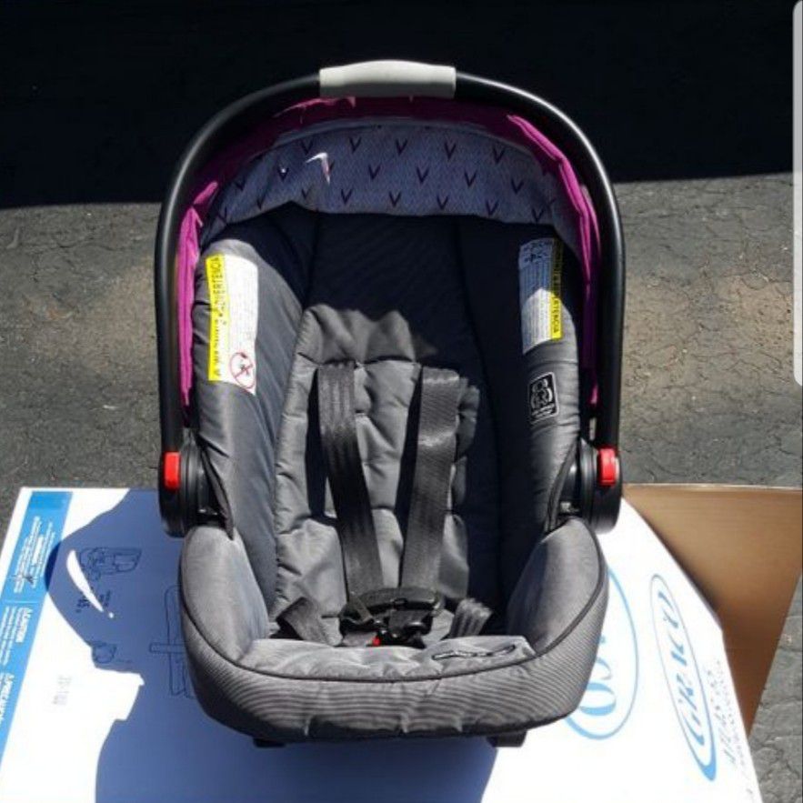 Grace double stroller and carseat with base