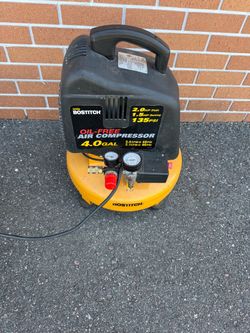 Bostitch 4-Gallon Oil-Free Pancake Air Compressor featuring a 2.0 peak HP motor and a maximum pressure rating of 135
