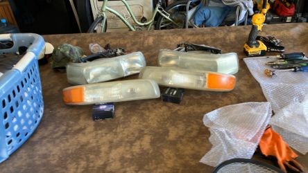 OEM headlights and running lights for a 2003 Chevy Tahoe