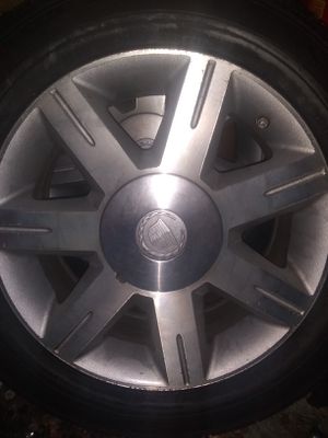 Photo 2 Cadillac DTS rims and tires