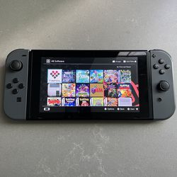 Nintendo Switch With Games & Gray Joy-Cons