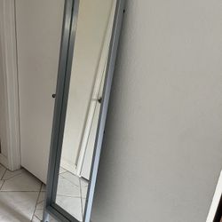 Rolling Specialty Wall Mirror