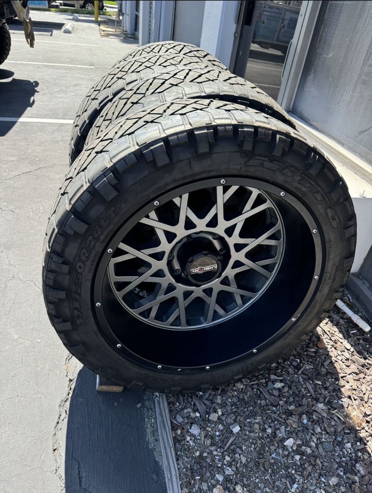 Vision Rocker 24x12 8x180 With Tires 37x12.50/24 Nitto Ridge Grappler fits Chevy 2500 3500 gmc Sierra Silverado 