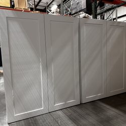 Two white shaker wall units, each 33” width and 42” height. Only $400 for both. 