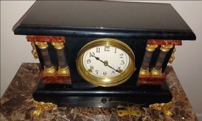 Antique Mantel Clock with Columns and Gold Accents